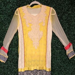 Light yellow 3 pieces Salwar kameez.